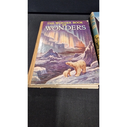 79 - Three vintage books.  Looking at History 1958, The wonder book of Wonders 1950's and Looking at the ... 