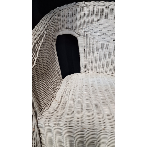 82 - A rattan tub chair in white