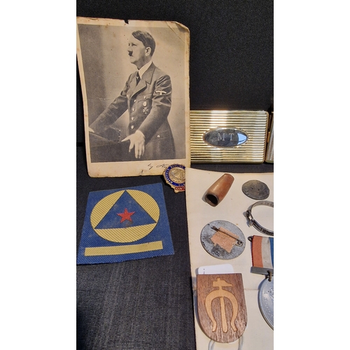 88 - A collection of vintage items including Militaria, pins, cap badges, buttons, Rhodia no.3 tobacco ti... 