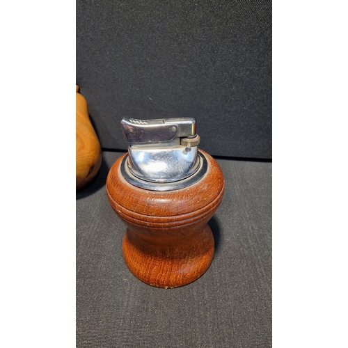 91 - A three piece hand turned set.  Yew wood Apple and pear and an oak table lighter