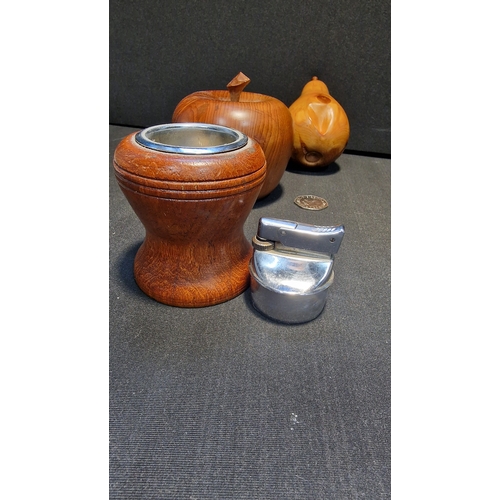 91 - A three piece hand turned set.  Yew wood Apple and pear and an oak table lighter