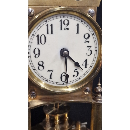 99 - A 400 day brass torsion clock , the white enamel dial with Arabic numerals, the movement stamped BHA... 