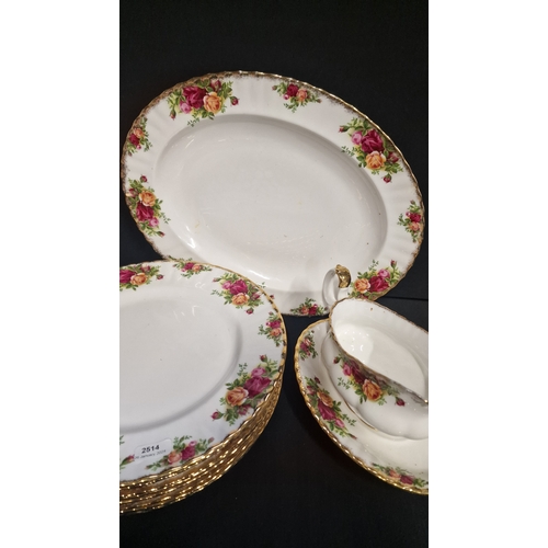 103 - Royal Albert Old Country Rose service.  Includes 8 dinner plates 26cm D, gravy boat and plate and a ... 