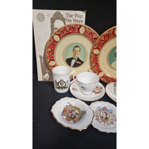 105 - A collection of royal memorabilia includes two Portland ware tin plates by The metal Box company and... 