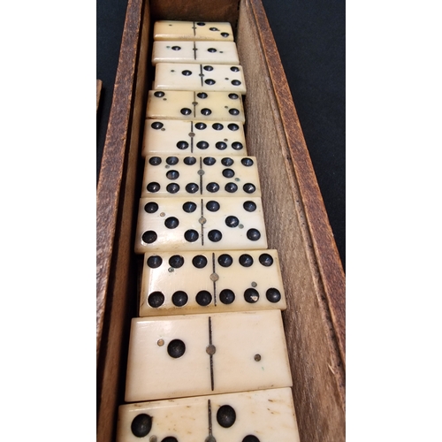 135 - A vintage Ebony and Bone domino set