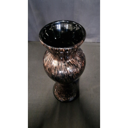 183 - A Bronze on black glass vase approximately 35cm Hb