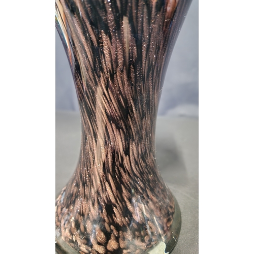 183 - A Bronze on black glass vase approximately 35cm Hb