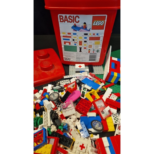 206 - A collection of 1988 Lego pieces, boards and characters