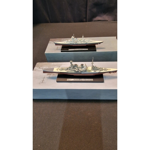 209 - Three collectable model ships.  HMS Repulse, Prinz Eugen and USS Missouri.