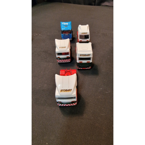 211 - A collection of 8 Corgi EDDIE STOBART haulage trucks.