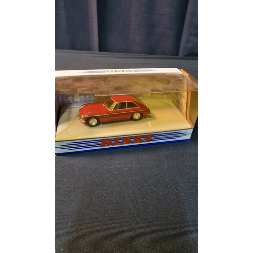 255 - Four Dinky matchbox collectables. 1068 E-type Jaguar, 1983 MGBT V9, 1955 Mercedes Benz 300sl bullyin... 