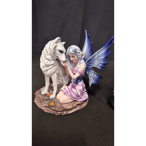 299 - NEMESIS NOW Nadine FIey & Wolf figurine and Dragon figurine from Mystic Legends range in silver fini... 