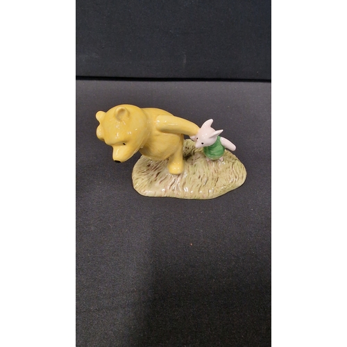 317 - Royal Doulton Winnie the Pooh and Piglet - The windy day