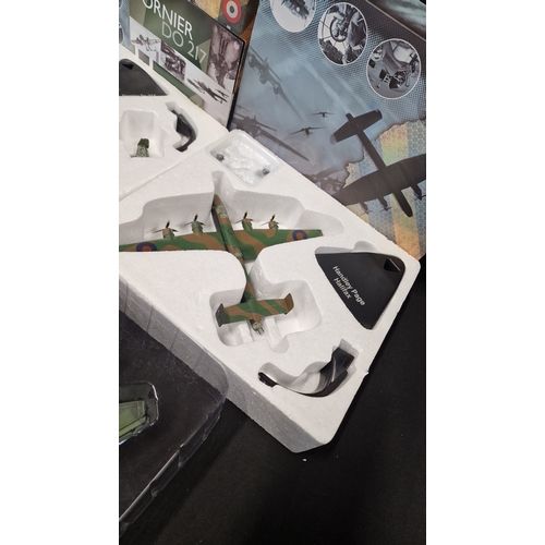 320 - Four collectable.model Planes.  Includes Junkers Ju 87b Stuka, 1940 Battle of Britian Hawker Hurrica... 