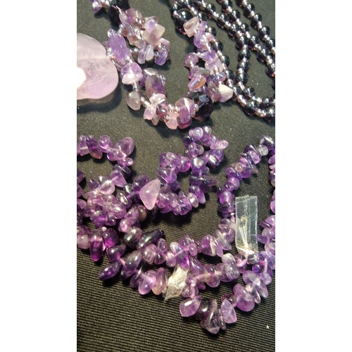 421 - A selection of Amethyst, bracelets, necklace with pendants and loose stones (stringed)