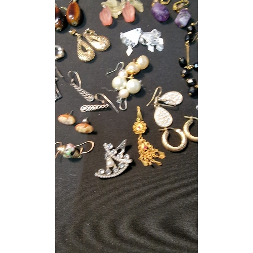 424 - Approximately 20 pairs of costume and sterling silver earings.