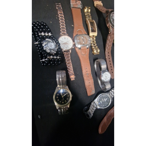 428 - A selection of men's and ladies various watches