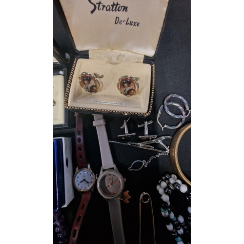 419 - A selection of costume jewellery includes vintage items.  Radley watch, bracelets, Stratton cuff lin... 