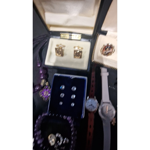 419 - A selection of costume jewellery includes vintage items.  Radley watch, bracelets, Stratton cuff lin... 