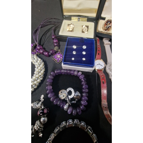 419 - A selection of costume jewellery includes vintage items.  Radley watch, bracelets, Stratton cuff lin... 