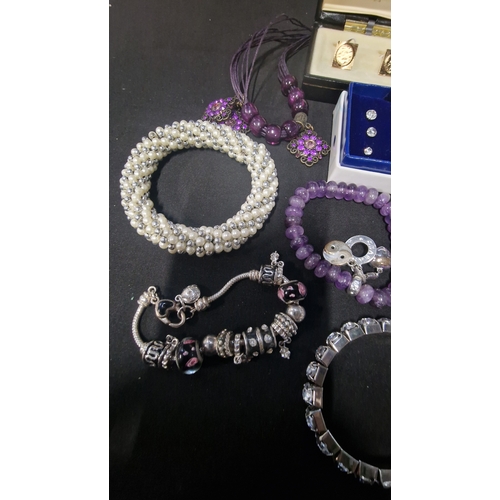 419 - A selection of costume jewellery includes vintage items.  Radley watch, bracelets, Stratton cuff lin... 