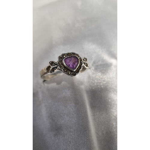 437 - Three sterling silver rings sizes P and R.  With CZ and amethyst