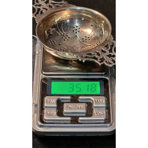 439 - Sterling silver tea strainer 
Weight 35.20g approximately