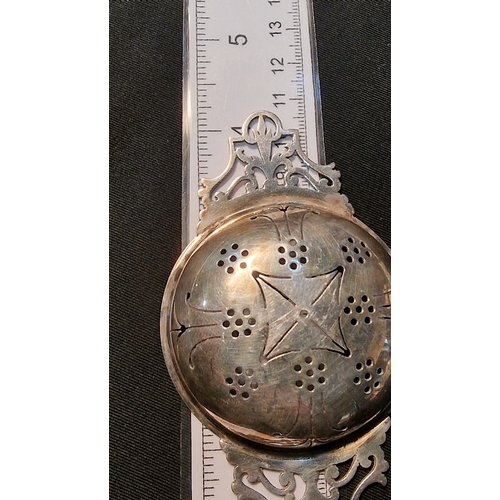 439 - Sterling silver tea strainer 
Weight 35.20g approximately