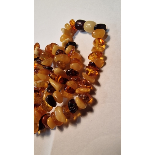 458 - A selection of Amber gems
Weight approximately 15.59g