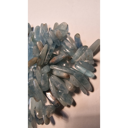 459 - A selection of rough aquamarine Stringed
Weight approximately 81.11