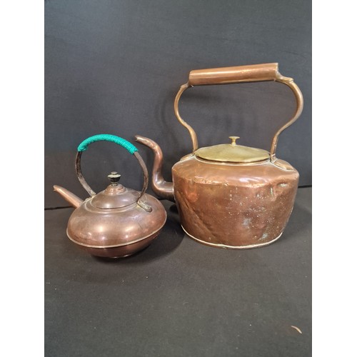 1 - Two brass and copper kettles.