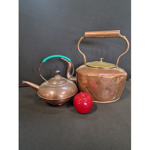 1 - Two brass and copper kettles.