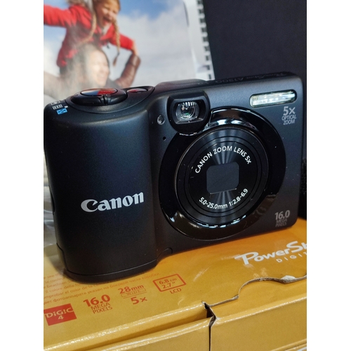 16 - Canon Powershot A1300 with box, manual, transfer wire and strap