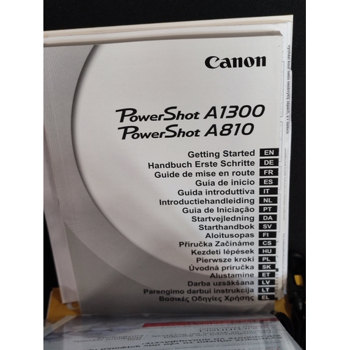 16 - Canon Powershot A1300 with box, manual, transfer wire and strap