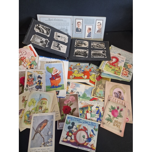 34 - A large quantity of antique and vintage celebration cards. Also Radio celebrities cigarette cards an... 