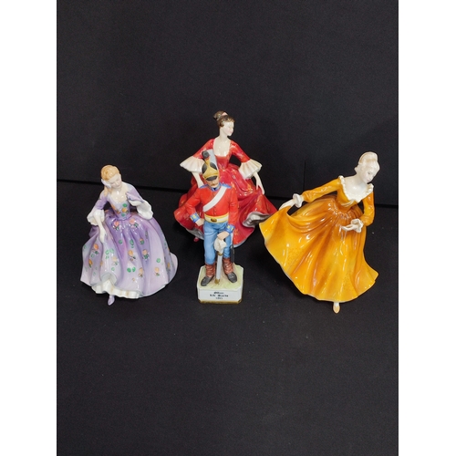 37 - Three Royal Doulton Figurines and an Alfretto Life Guard figurine