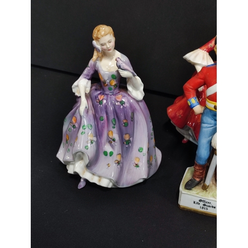 37 - Three Royal Doulton Figurines and an Alfretto Life Guard figurine