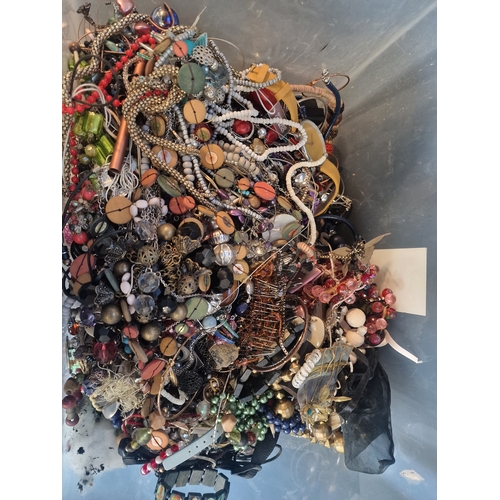 44 - A huge collection of  Unsorted costume Jewellery.  AF