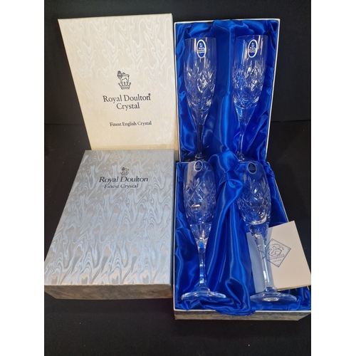 47 - Four boxed Royal Doulton Crystal champagne flutes.  Unused.