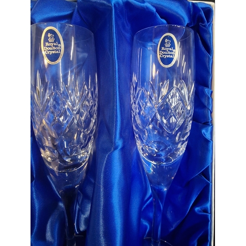 47 - Four boxed Royal Doulton Crystal champagne flutes.  Unused.