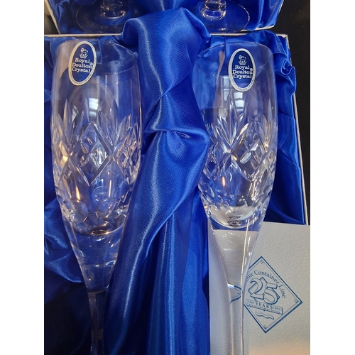 47 - Four boxed Royal Doulton Crystal champagne flutes.  Unused.