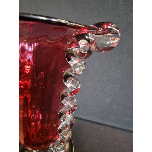 73 - Venetian style hand blown cranberry glass vase. 22cm H x 19cm W approximately