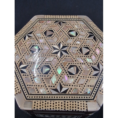 220 - A vintage inlayed mother of pearl trinket /  Jewellery Box.
10.5-12.5 cm D approximately