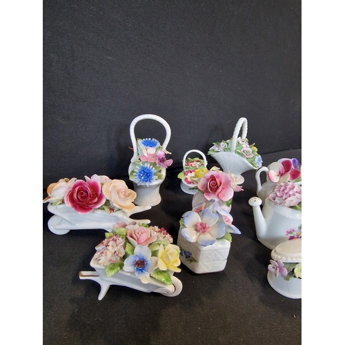 227 - A collection of Royal Doulton, Royle Stafford, Sheridan and Adderley mini fine china flower posies.