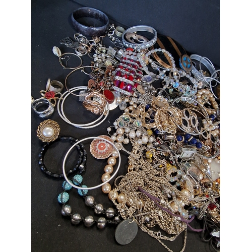 230 - A large selection of costume jewellery.