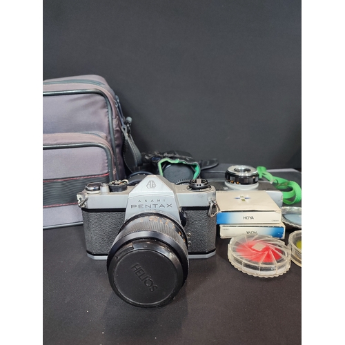 254 - Pentax Asahi and Olympus Trip 35 film cameras with 4 lenses and accessories along with a Fotima Carr... 