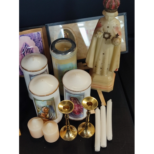 259 - Collection of religious items including ornaments, candles and a crucifix