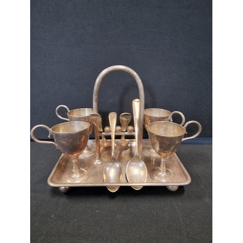 318 - Vintgae silver plate breakfast set - four egg cups and spoons