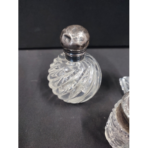 321 - 3 cut crystal scent bottles with Silver lids