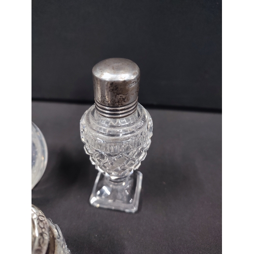 321 - 3 cut crystal scent bottles with Silver lids